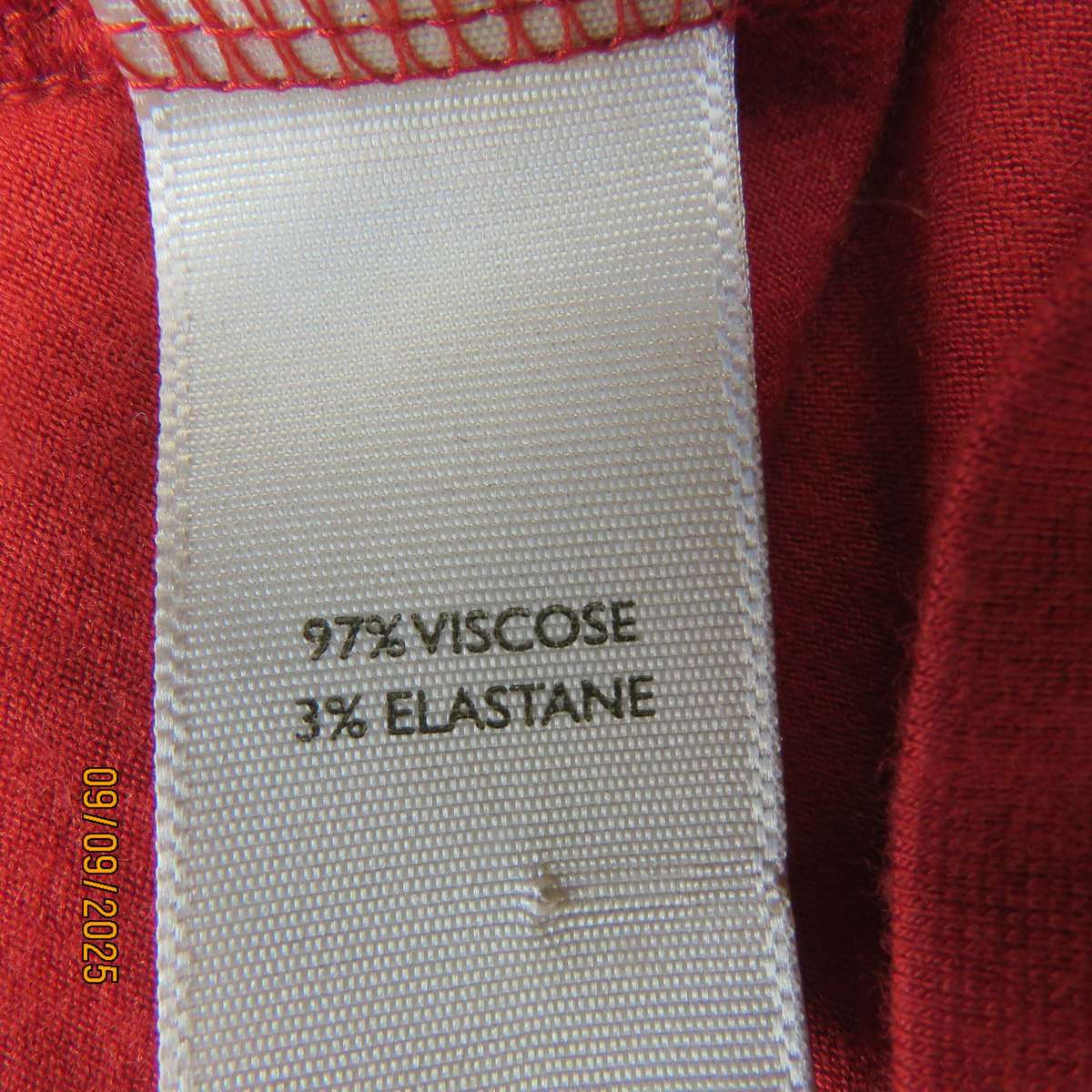 WOOLWORTHS burnt orange stretch viscose top with antique gold neckline embellishment. Size 38