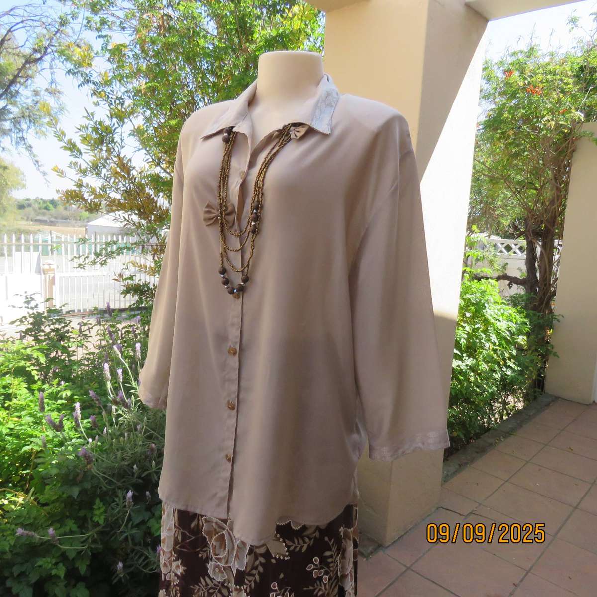 Ecru colour thin soft feather light button down long sleeve top. Size 42