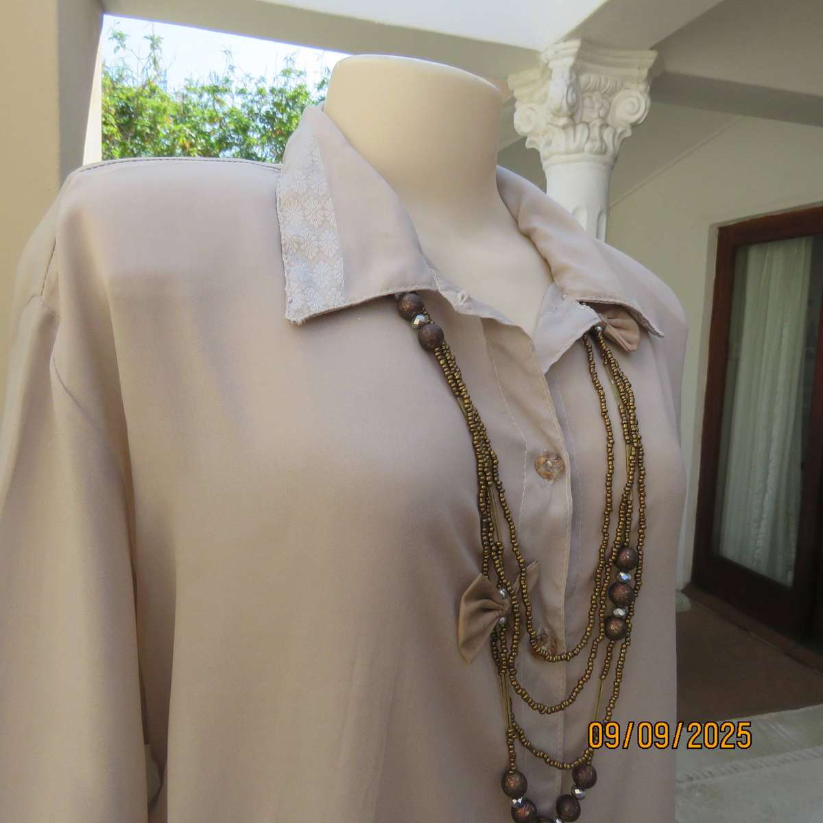 Ecru colour thin soft feather light button down long sleeve top. Size 42