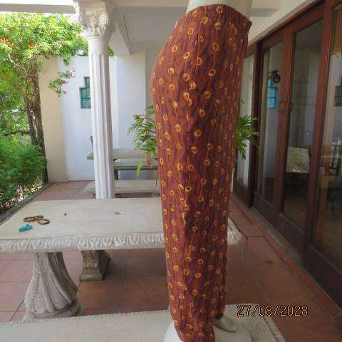 Melrose Studio golden brown silk pants with vertical gold broken stripe print, size 36