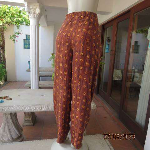 Melrose Studio golden brown silk pants with vertical gold broken stripe print, size 36