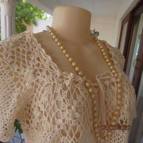Rich cream crochet slip-over top in 100% cotton, size 38-40