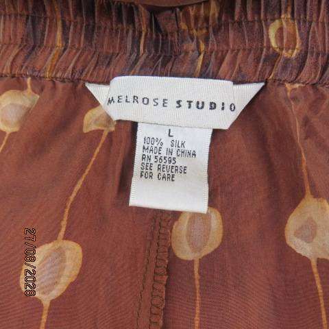 Melrose Studio golden brown silk pants with vertical gold broken stripe print, size 36
