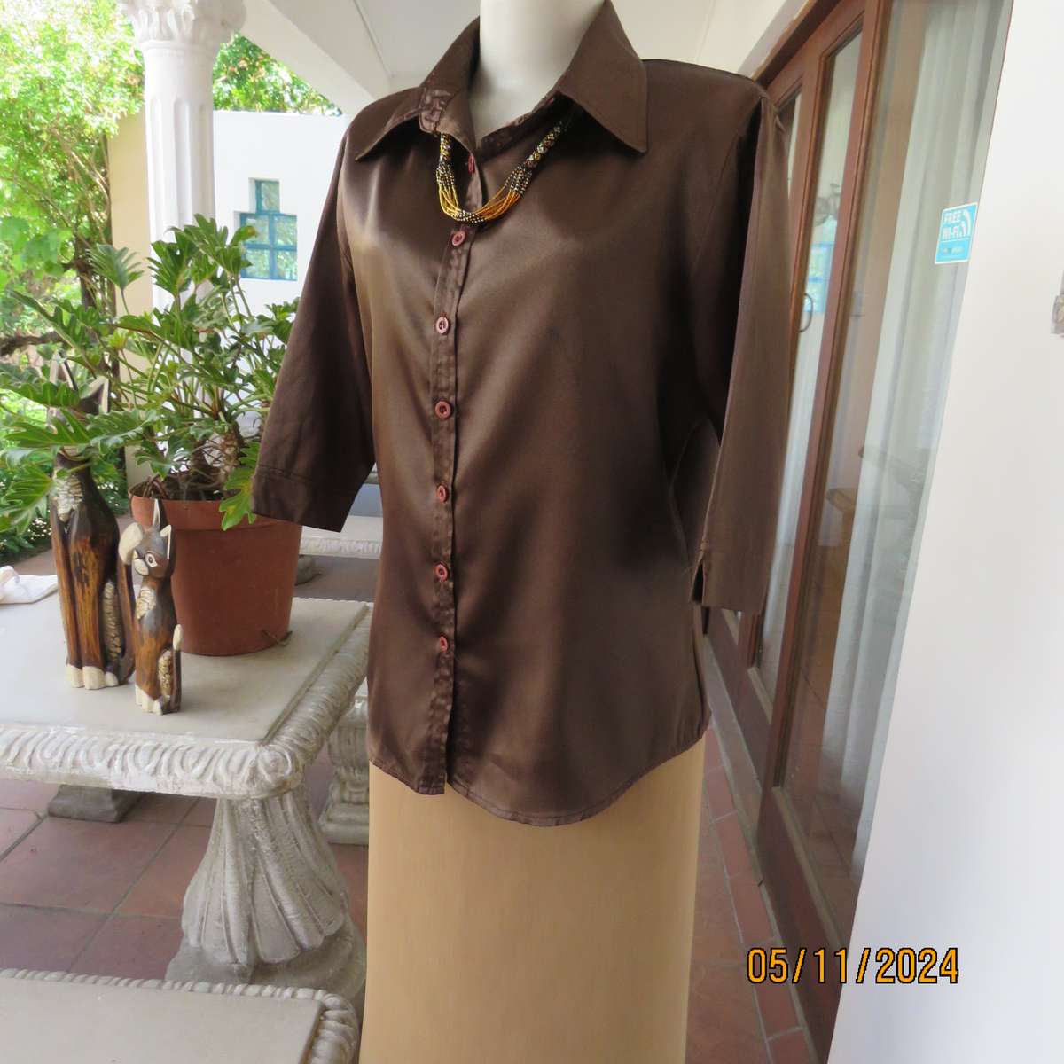 Choc brown silky polycotton button down top with shirt collar. Size 36. Elbow sleeves. As new.