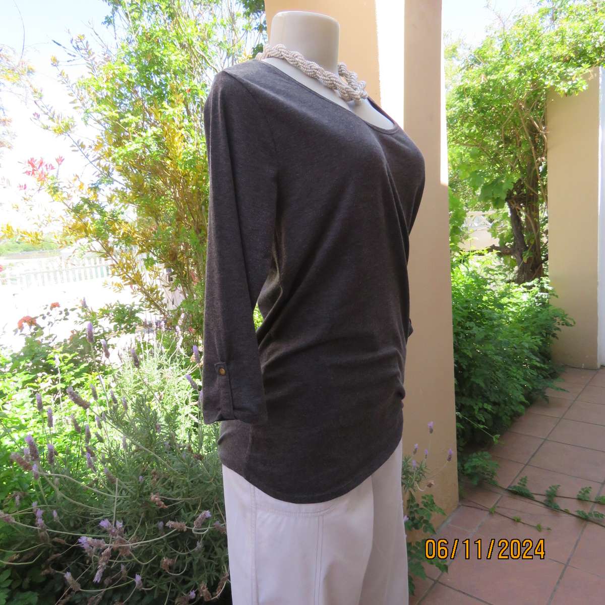 Mottled grey polycotton stretch top size 36-38. Bracelet length sleeves.