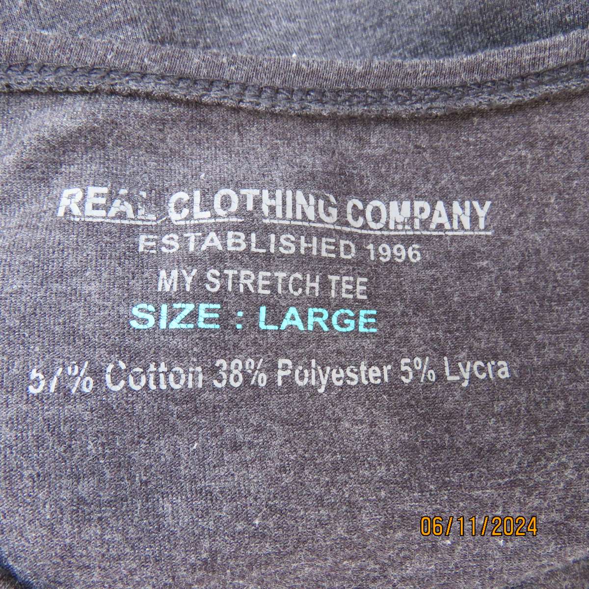 Mottled grey polycotton stretch top size 36-38. Bracelet length sleeves.