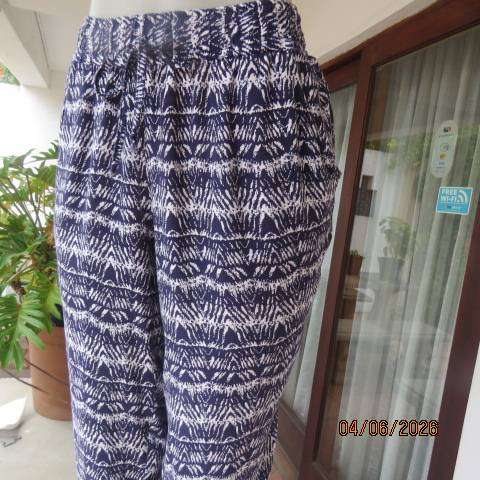 Navy and white viscose casual pants with wide elasticated waist and side pockets, size 38