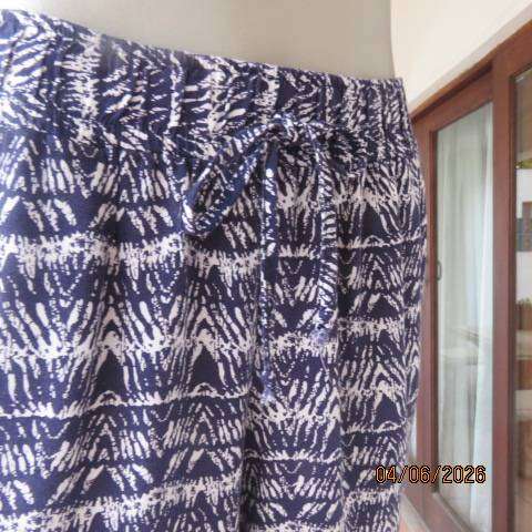 Navy and white viscose casual pants with wide elasticated waist and side pockets, size 38