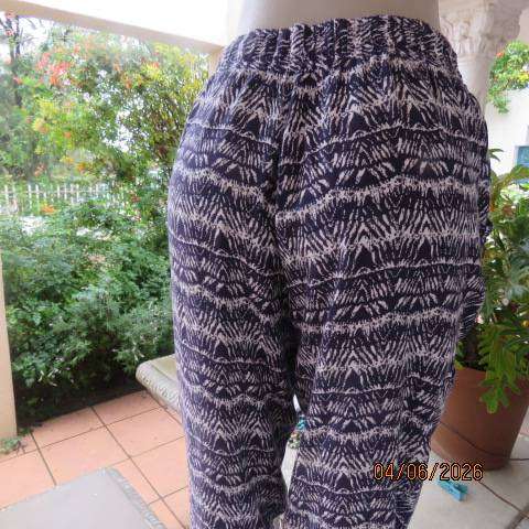 Navy and white viscose casual pants with wide elasticated waist and side pockets, size 38