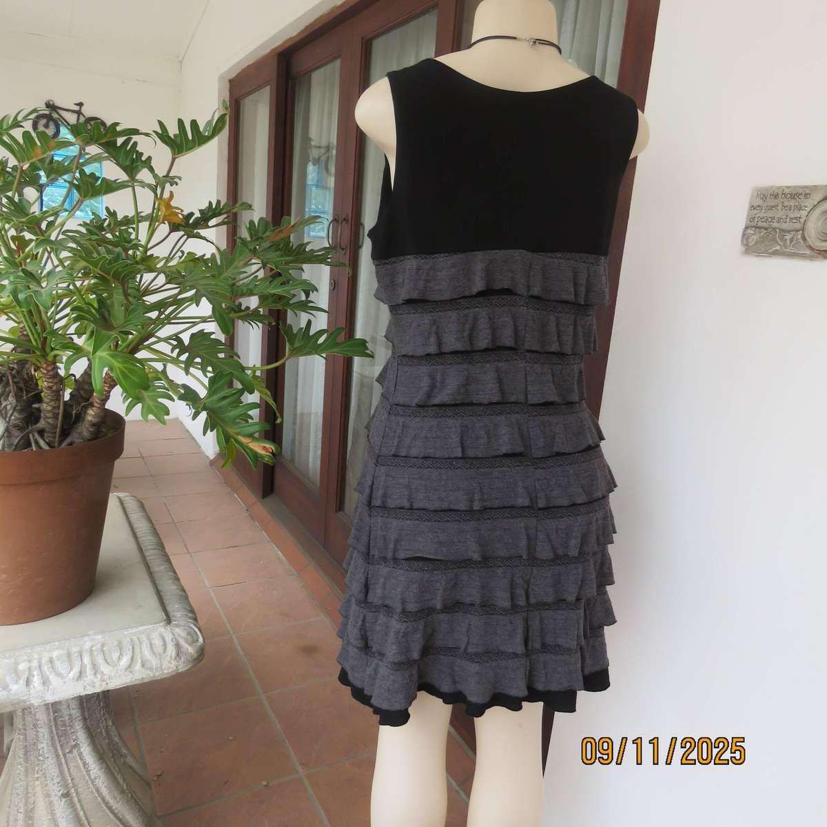 OASIS black stretch poly-rayon slip over sleeveless dress with grey ruffles. Size 36