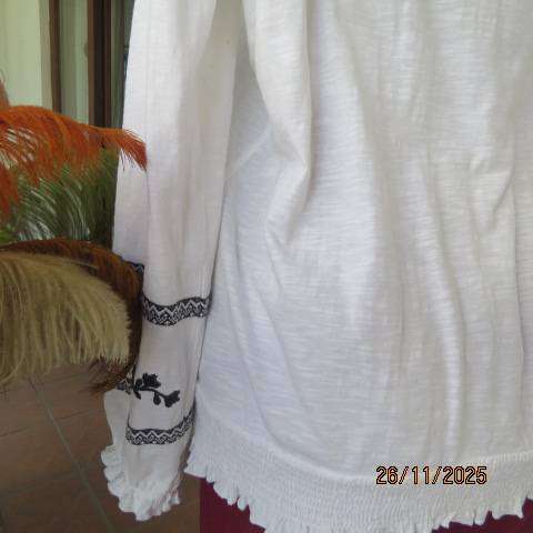 WOOLWORTHS white cotton slip over long sleeve top with black embroidery. Size 42