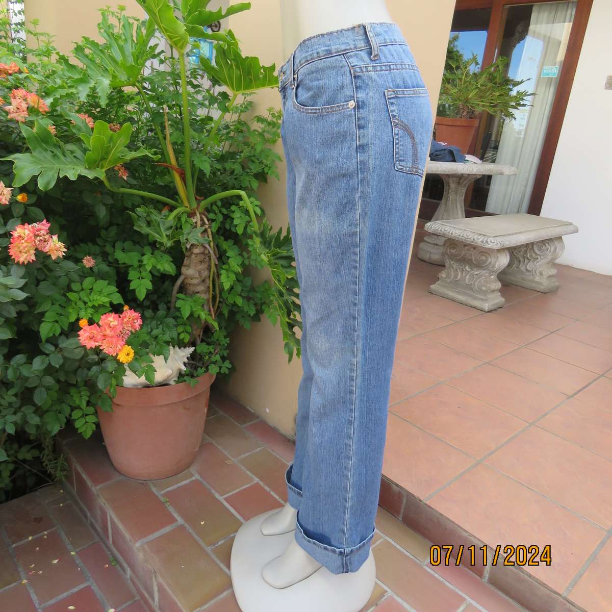 NEWS blue denim straight legged jeans in polycotton stretch. Size 36. Turnovers. Pockets back-front.