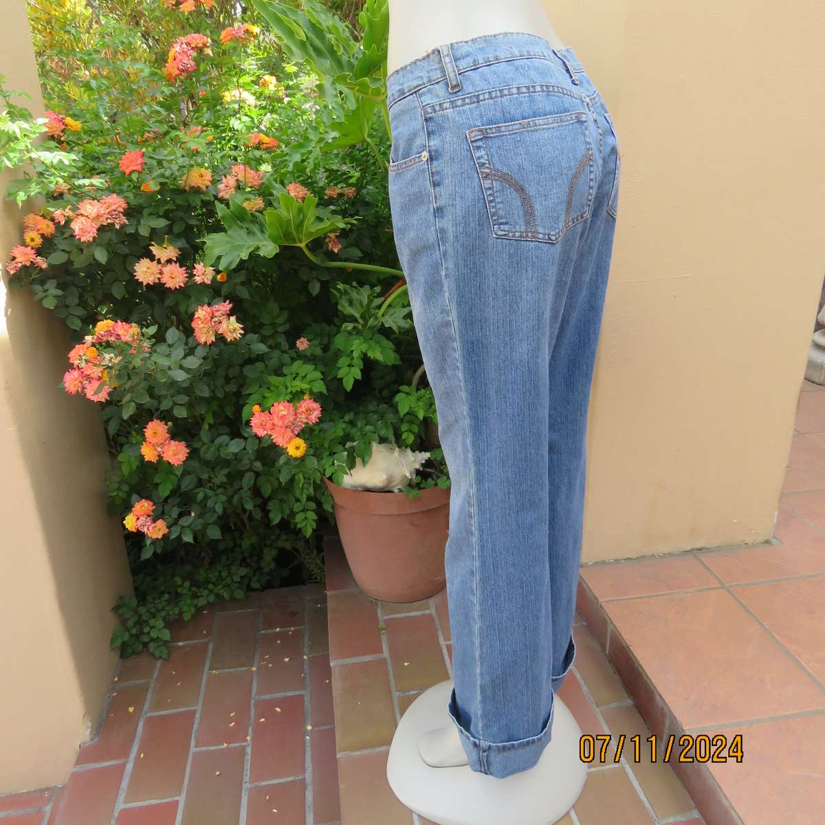 NEWS blue denim straight legged jeans in polycotton stretch. Size 36. Turnovers. Pockets back-front.