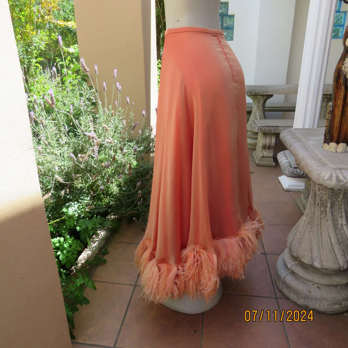 Glamorous half flare peach long skirt-underlay idark crimson satin. Size 36-38.Ostrich feather seam