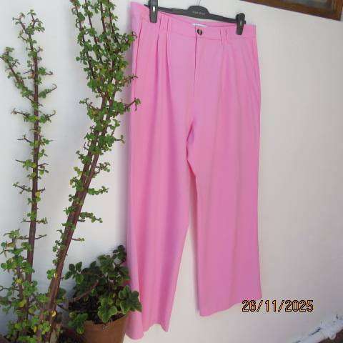 WOOLWORTHS cotton-rayon flamingo pink straight legged pants in size 42