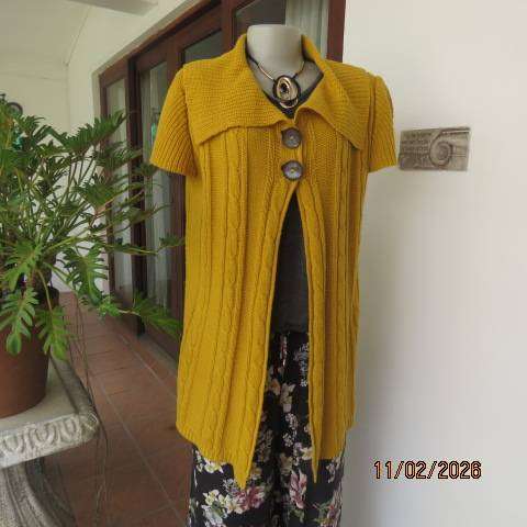 Mustard yellow open knitted acrylic long cardigan with tiny capped sleeves. Size 38