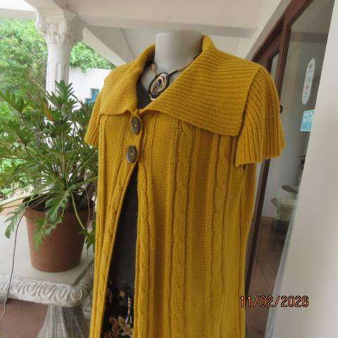 Mustard yellow open knitted acrylic long cardigan with tiny capped sleeves. Size 38