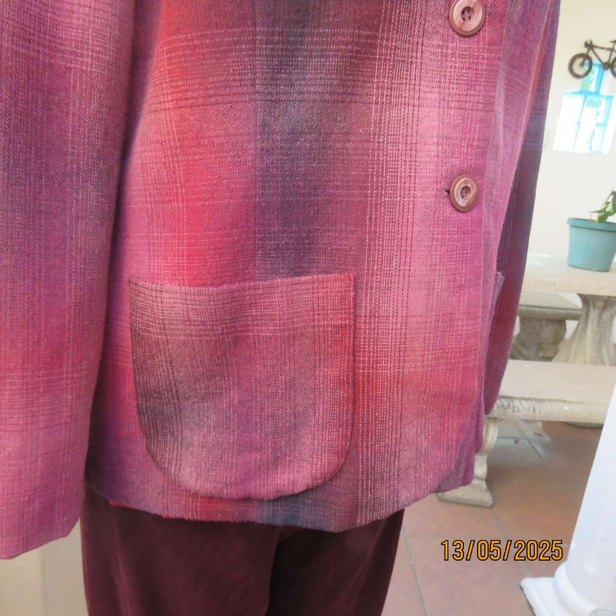Warm woolen fully lined long sleeve jacket size 40 in reds-pinks and navy.