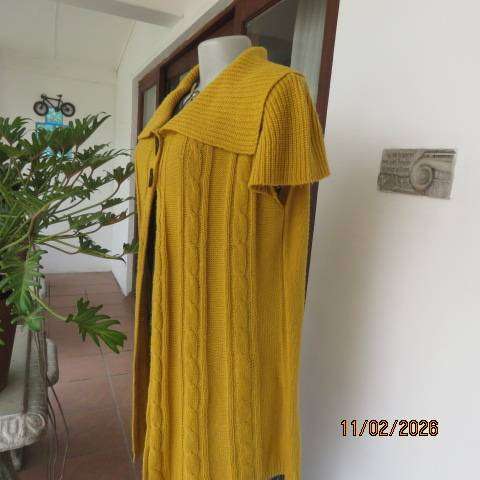 Mustard yellow open knitted acrylic long cardigan with tiny capped sleeves. Size 38