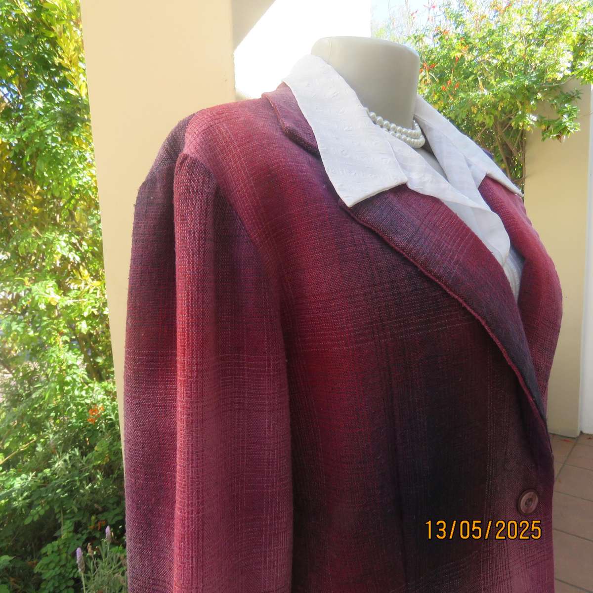 Warm woolen fully lined long sleeve jacket size 40 in reds-pinks and navy.