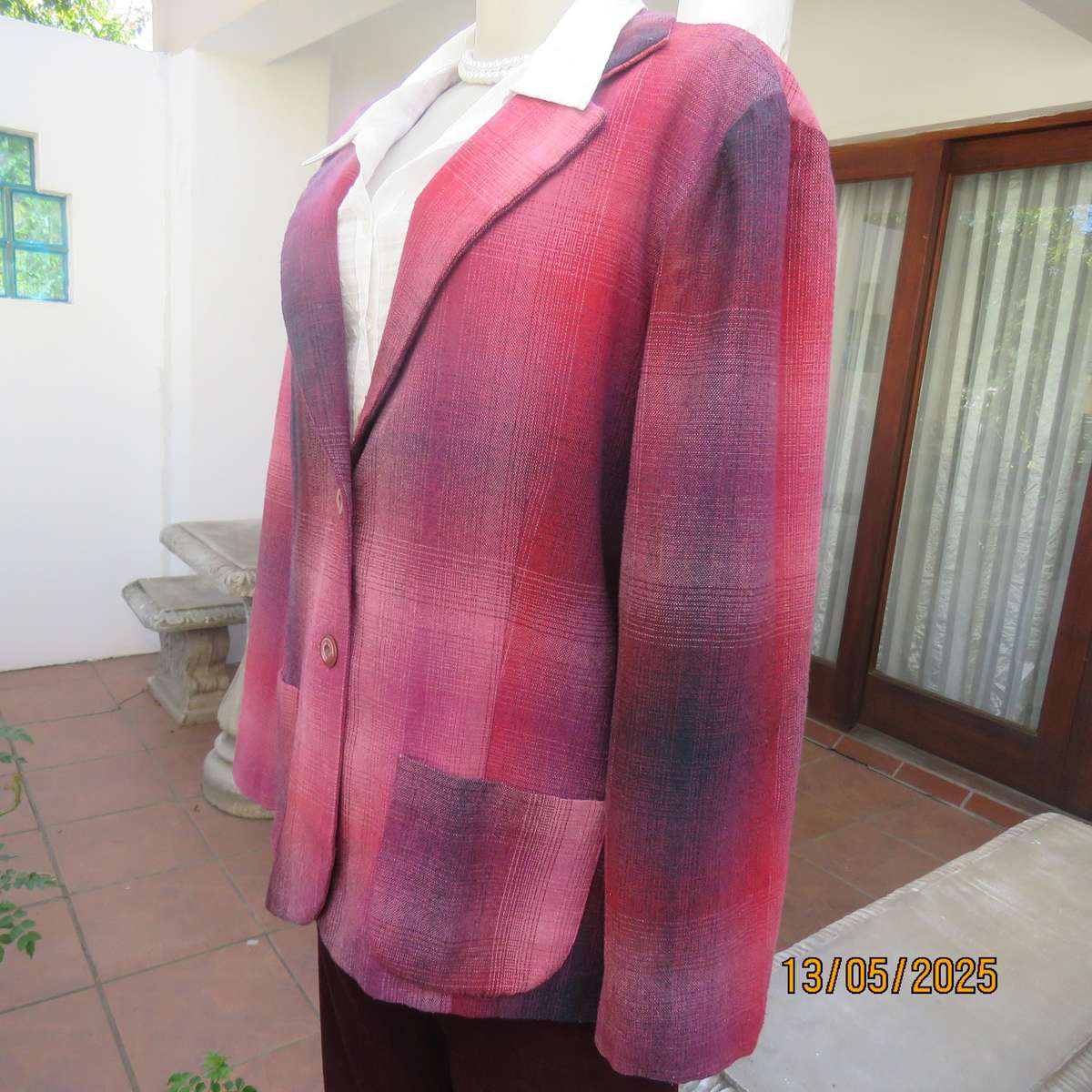 Warm woolen fully lined long sleeve jacket size 40 in reds-pinks and navy.