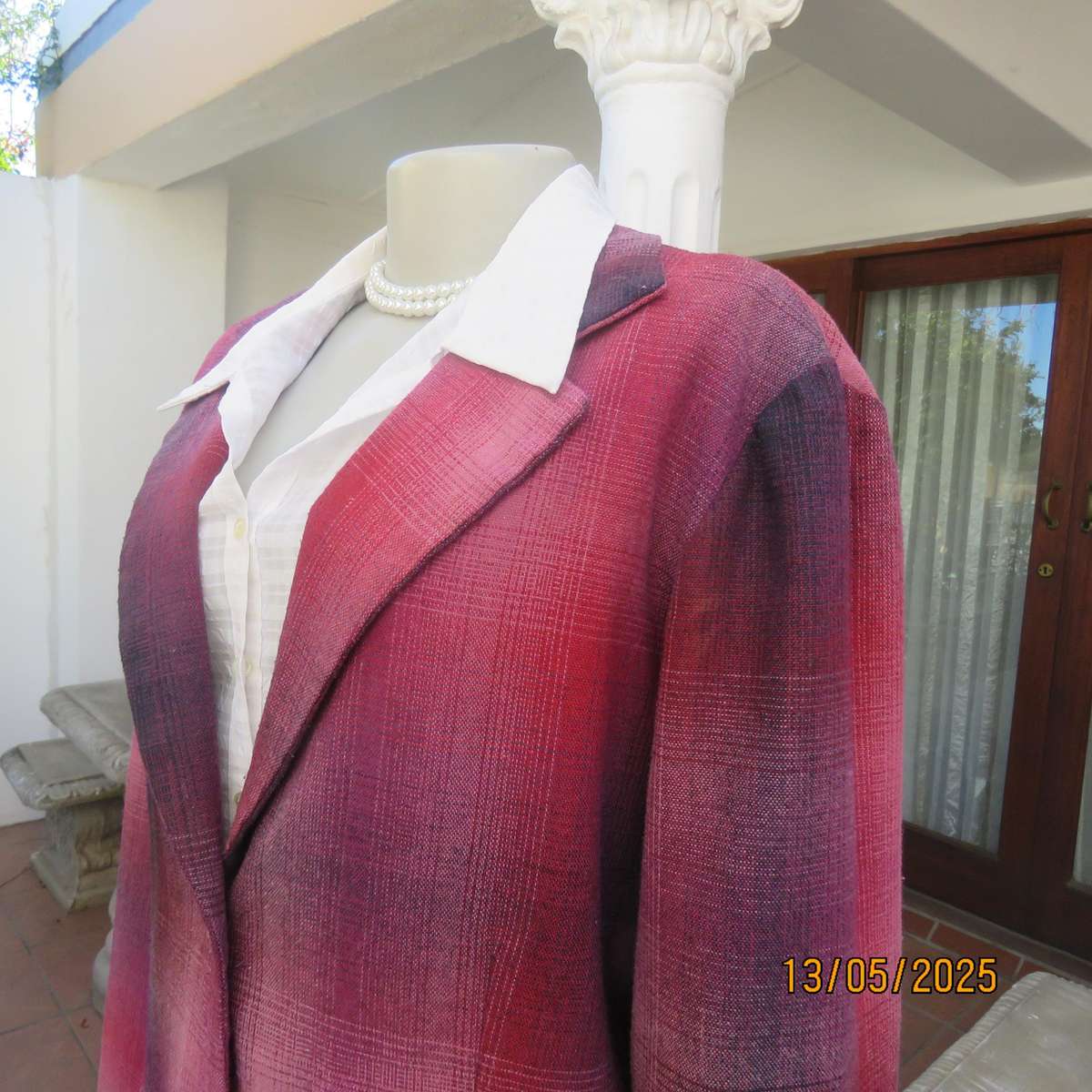 Warm woolen fully lined long sleeve jacket size 40 in reds-pinks and navy.