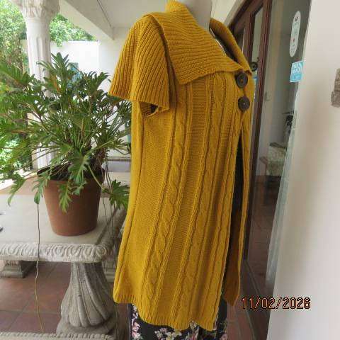 Mustard yellow open knitted acrylic long cardigan with tiny capped sleeves. Size 38