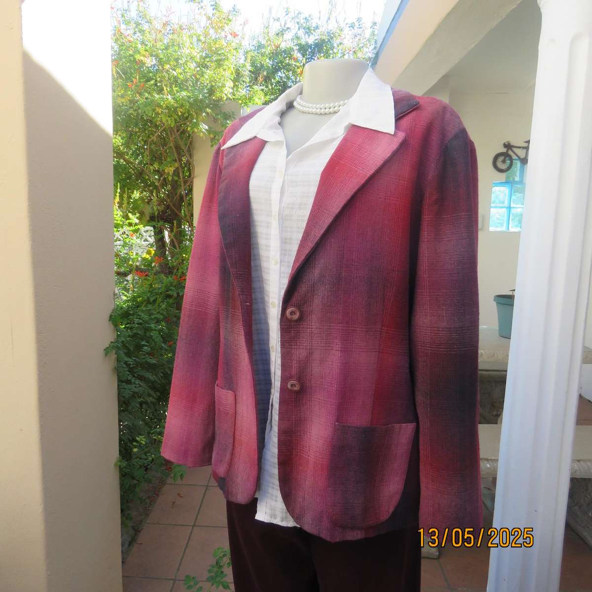 Warm woolen fully lined long sleeve jacket size 40 in reds-pinks and navy.