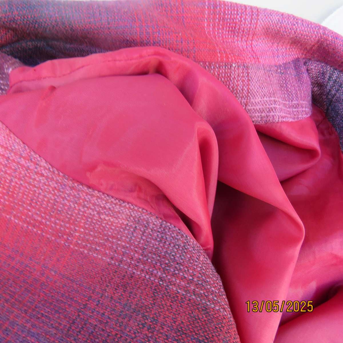 Warm woolen fully lined long sleeve jacket size 40 in reds-pinks and navy.