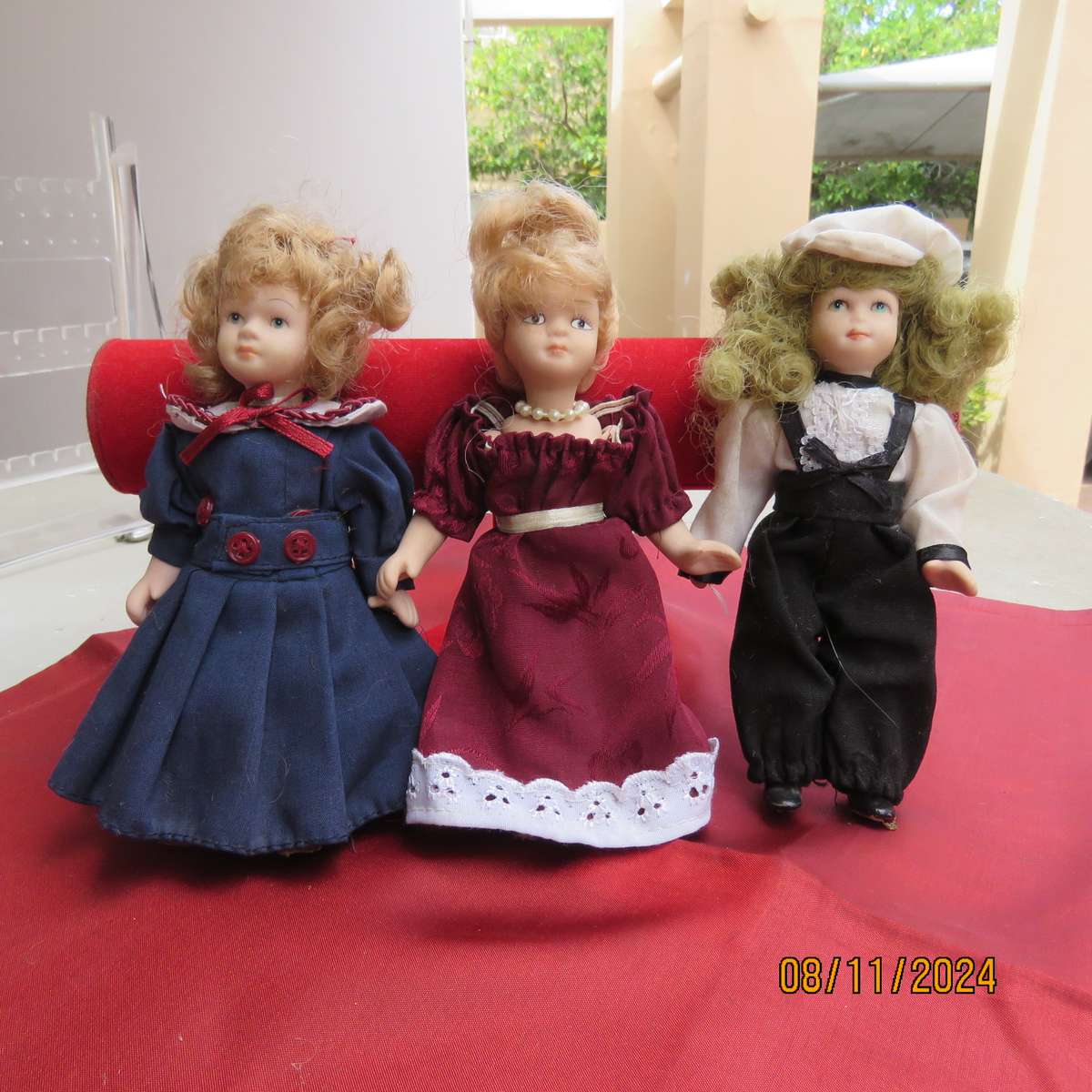 Set of 3 antique dolls. Height 15.5cm. All dresses, with hair and limbs in tact.