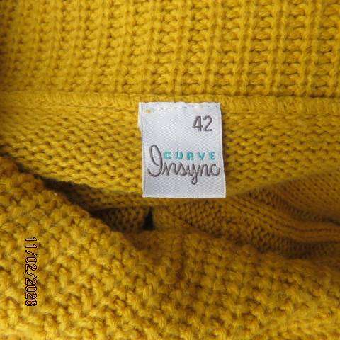 Mustard yellow open knitted acrylic long cardigan with tiny capped sleeves. Size 38