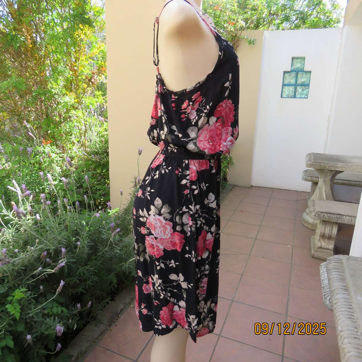 Black 100% rayon strappy dress with bold pink flowers. Size 38