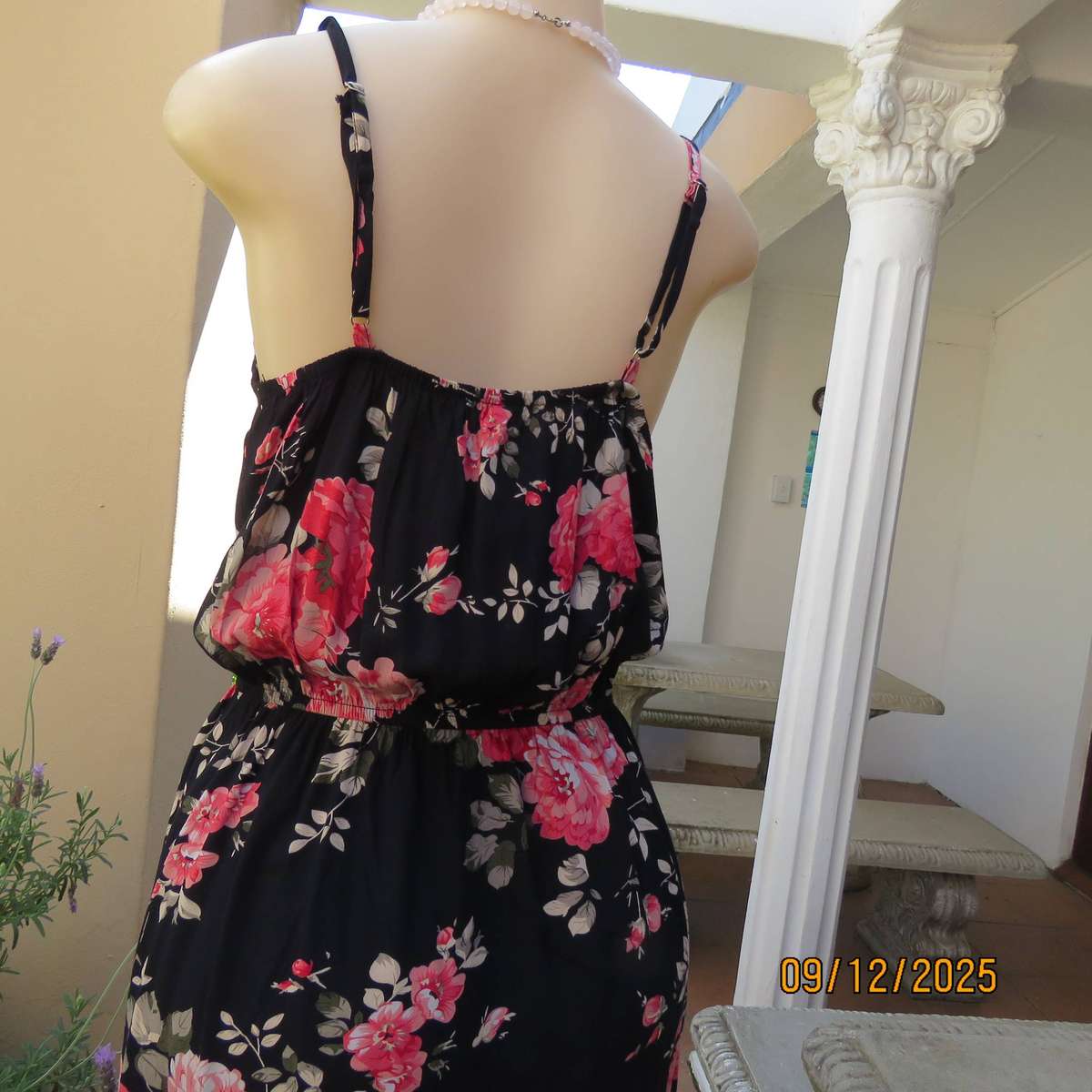 Black 100% rayon strappy dress with bold pink flowers. Size 38
