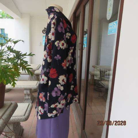CABRILCO navy textured long sleeve polyester top with lilac, cream & brick floral print, size 40