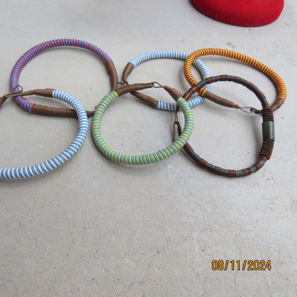 Selection of 6 ethnic bangles in different sizes and looks. Made from copper wire and plastic. New