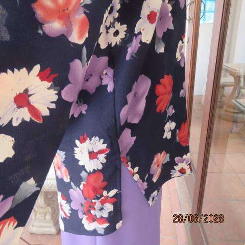 CABRILCO navy textured long sleeve polyester top with lilac, cream & brick floral print, size 40