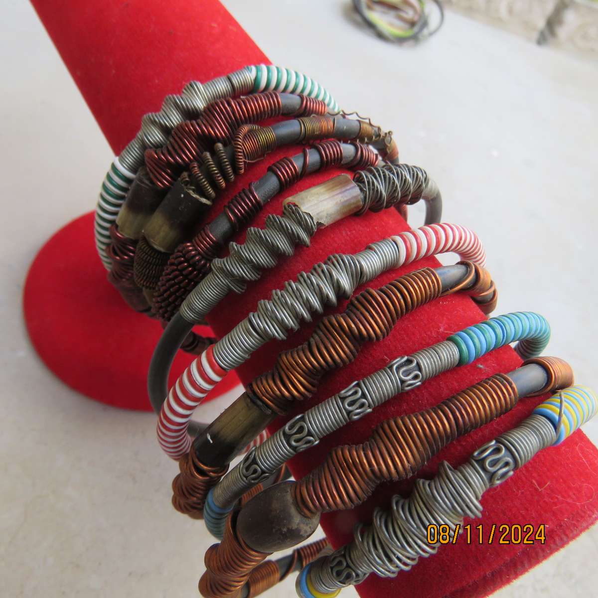 Selection of 10 popular ethnic bangles made from copper-steel wire-plastic-bone. Never used.