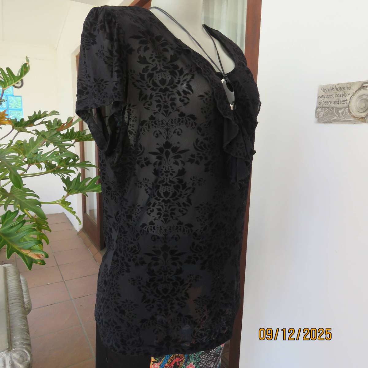 FASHION Express black opaque polyester top with velvety flowers. Size 42