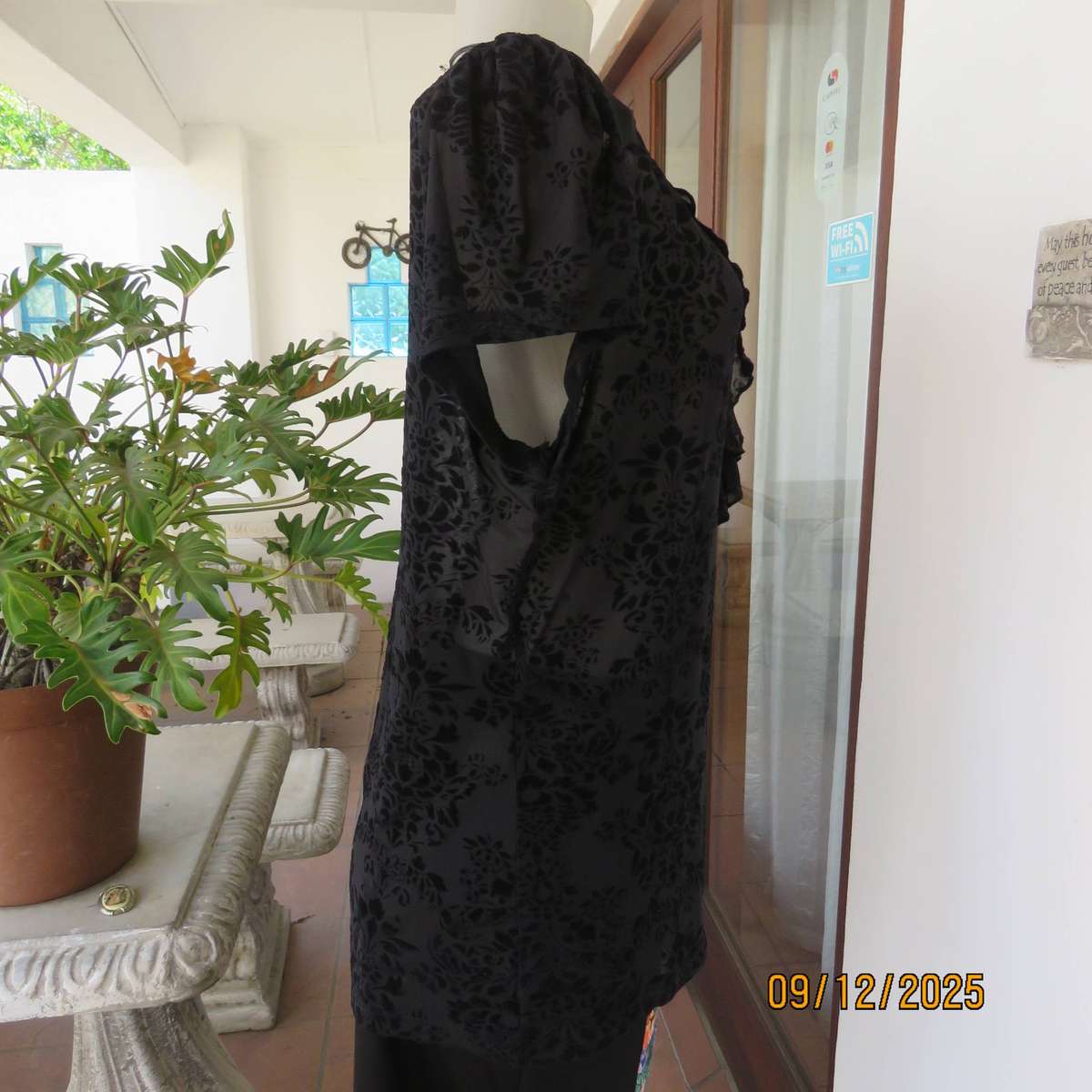 FASHION Express black opaque polyester top with velvety flowers. Size 42