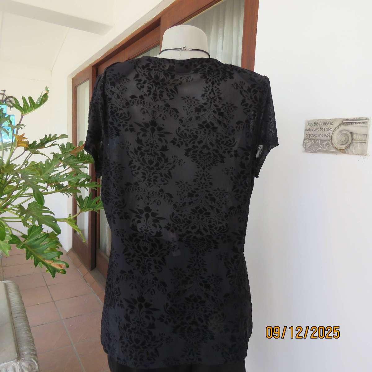 FASHION Express black opaque polyester top with velvety flowers. Size 42