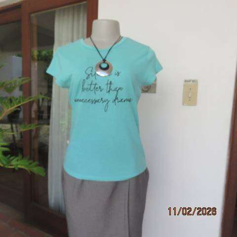 Aquamarine slip over capped sleeve polycotton top with black logo. Size 34