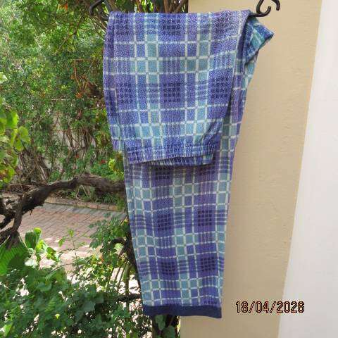 Men's winter pajamas in blue and jade check fabric with front pocket, size medium