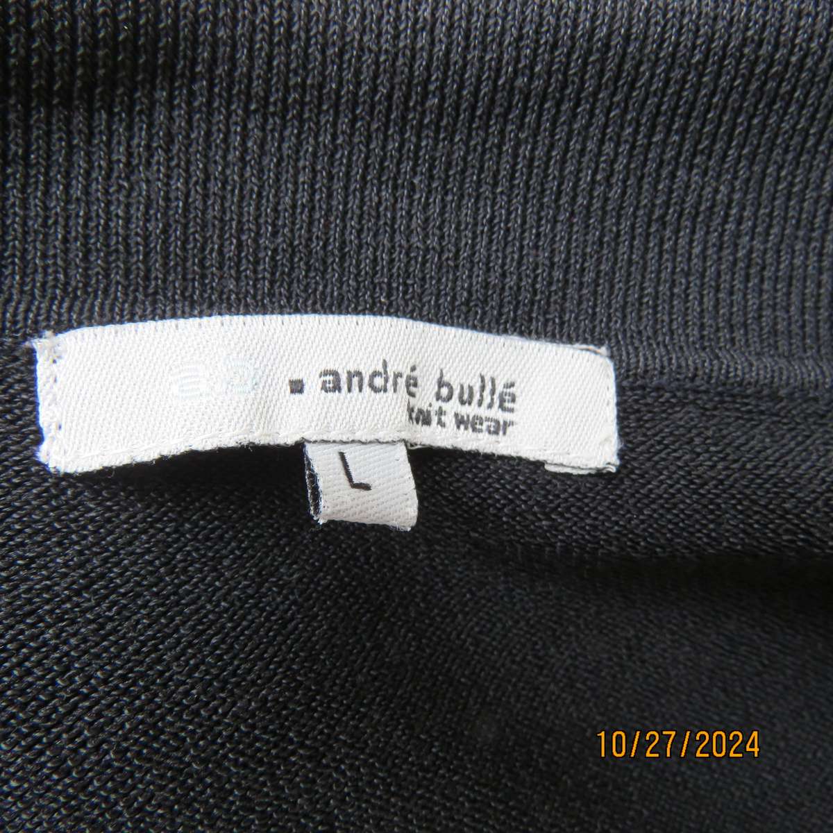 ANDRE BULLE imported black rayon-poliamida blend knitted golf style top. Size 38. As new