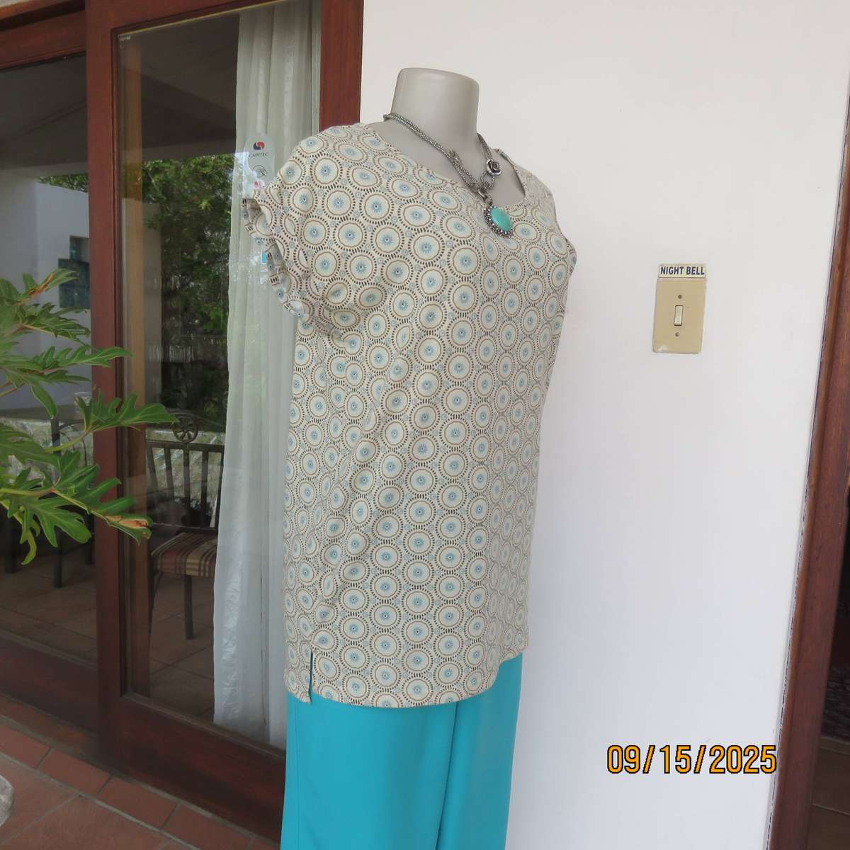 Beige slip over long polyester stretch top with brown circles-jade inners. Size 34-36