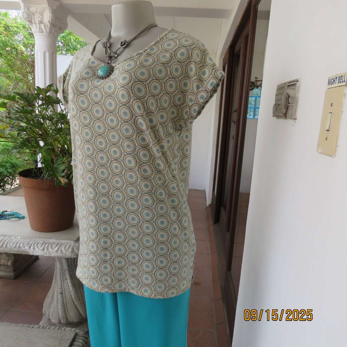 Beige slip over long polyester stretch top with brown circles-jade inners. Size 34-36