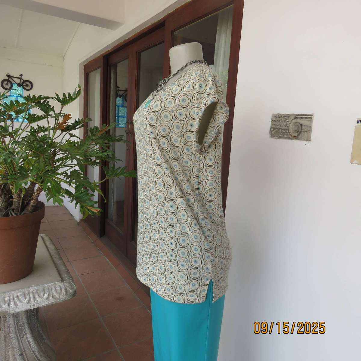 Beige slip over long polyester stretch top with brown circles-jade inners. Size 34-36