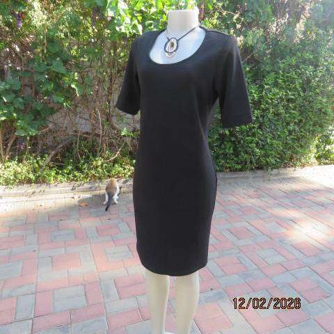 Very black textured stretch polyester slip over shift dress with long short sleeves. Size 36