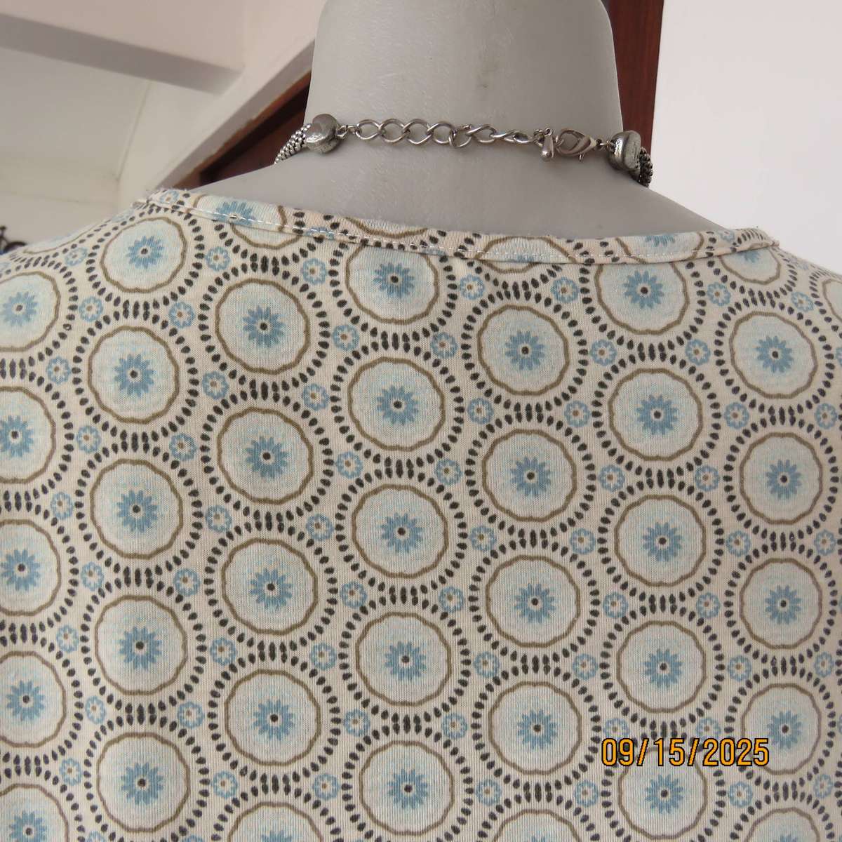 Beige slip over long polyester stretch top with brown circles-jade inners. Size 34-36