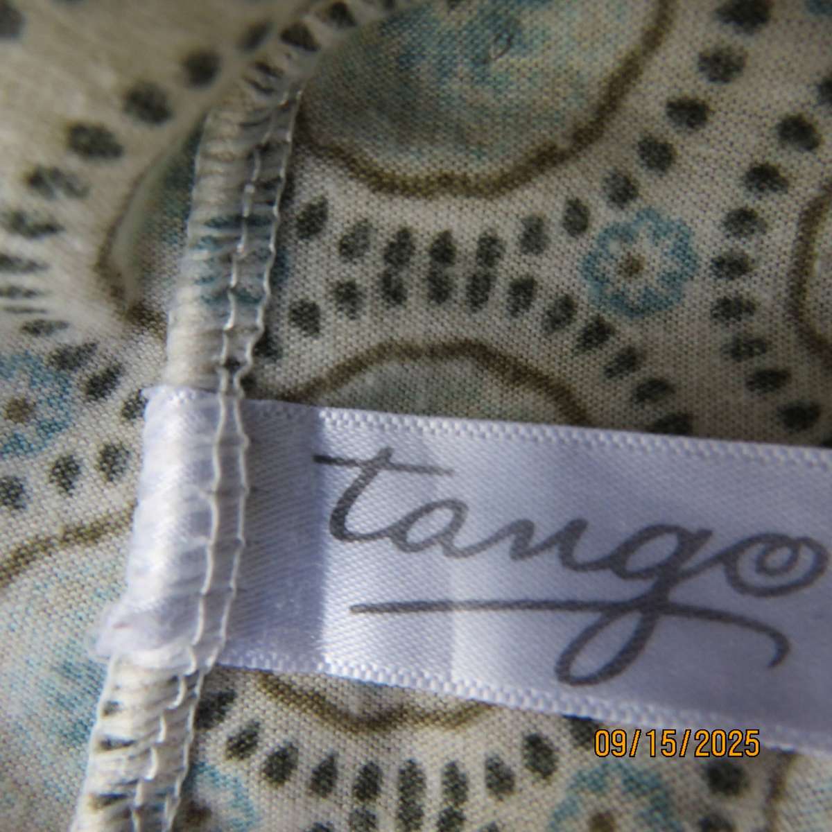Beige slip over long polyester stretch top with brown circles-jade inners. Size 34-36