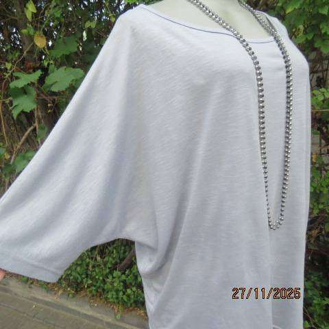 Light blue-grey slip over stretch polyester-rayon top with short cut-on sleeves. Size 42